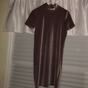 Turtle neck pink dress.